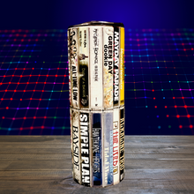Load image into Gallery viewer, A 20 oz stainless steel insulated tumbler featuring sublimated cassette designs with band names from the Elder Emo era, including Paramore, Fall Out Boy, My Chemical Romance, Blink-182, and The All-American Rejects. Comes with a secure lid and reusable straw, perfect for hot and cold drinks.