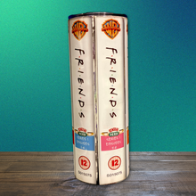 Load image into Gallery viewer, A 20 oz stainless steel insulated tumbler featuring a sublimated design inspired by the TV show Friends, showcasing Series 1 episodes like Episodes 17-20 and Episodes 21-24. Includes a secure lid and reusable metal straw, perfect for hot and cold drinks.