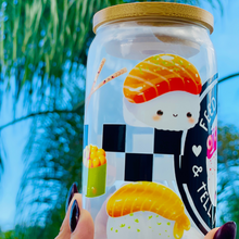 Load image into Gallery viewer, Feed Me Sushi and Tell Me I'm Pretty 16 oz glass cup with bamboo lid and reusable glass straw, featuring a sushi-themed design with colorful rolls, soy sauce, and chopsticks.