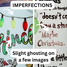 Load image into Gallery viewer, A 20 oz stainless steel insulated tumbler featuring a fun pattern with iconic Grinch quotes. Comes with a clear lid, metal straw, and straw cleaner, perfect for hot and cold drinks. Discounted due to slight ghosting in three small spots.