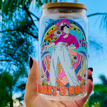Load image into Gallery viewer, A 16oz BPA-free glass cup with a retro-inspired UVDTF design featuring Harry Styles in wide-leg pants and a pink shirt, with a bamboo lid and reusable glass straw. Perfect for fans of the Harry’s House album.