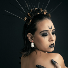 Load image into Gallery viewer, A model dressed in black costume wearing a pair of fun Halloween ghost earrings with the text 'Here for the BOOty,' designed for adding a playful, quirky touch to Halloween accessories and fashion.