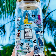 Load image into Gallery viewer, A 20 oz glass cup featuring colorful cat illustrations and Taylor Swift album-inspired designs, with the phrase "Karma is a Cat," paired with a bamboo lid and glass straw. Perfect for Swifties and cold drink lovers.
