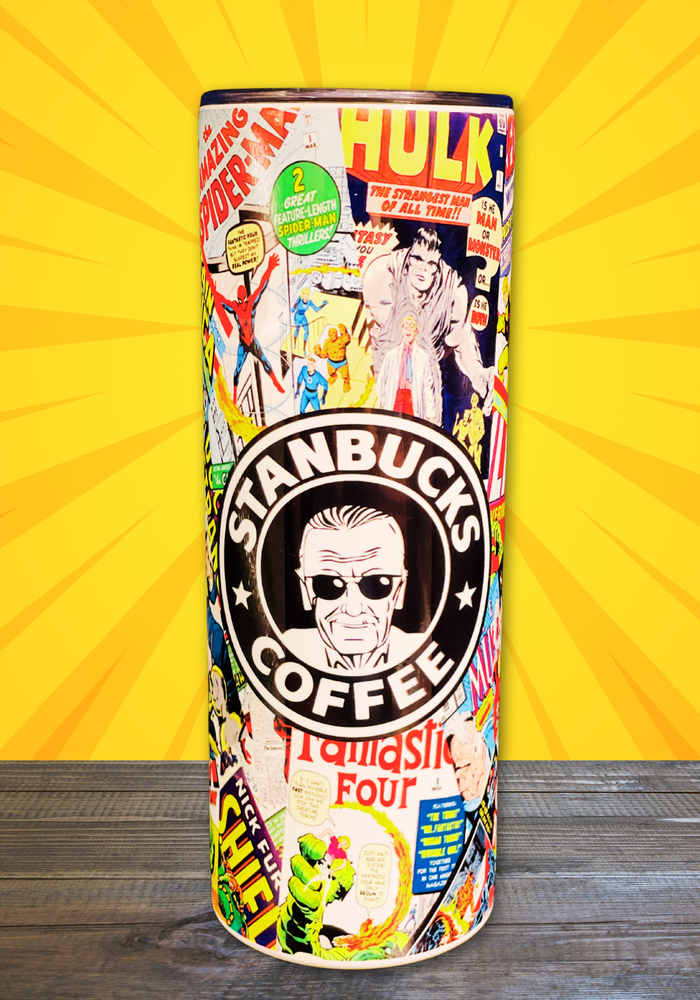A 20 oz stainless steel insulated tumbler featuring a sublimated design of Marvel comic book strips, including The Hulk, Fantastic Four, and Spider-Man, with a