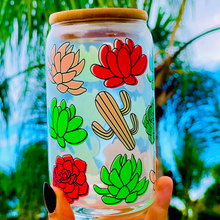 Load image into Gallery viewer, A 16 oz glass cup featuring a colorful succulent and cactus design with a bamboo lid and reusable glass straw. Perfect for cold drinks, eco-friendly, and BPA-free. Handwash only.