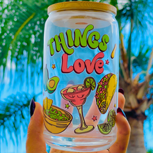Load image into Gallery viewer, A 20oz BPA-free glass cup with a colorful UVDTF wrap featuring tacos, margaritas, guacamole, and lime wedges. Complete with a bamboo lid and reusable glass straw, perfect for happy hour lovers.
🌮🍹