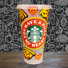 Load image into Gallery viewer, A 16 oz reusable Starbucks-compatible cold cup with a marble-changing design that shifts to orange, red, and blue when filled with cold liquid. The cup features a playful vinyl wrap reading "You Have a Pizza My Heart" and comes with a clear plastic lid and reusable straw, ideal for iced coffee lovers.