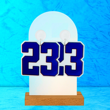 Load image into Gallery viewer, Earrings featuring a blue &#39;23&#39; in Varsity font in front of a blue backdrop
