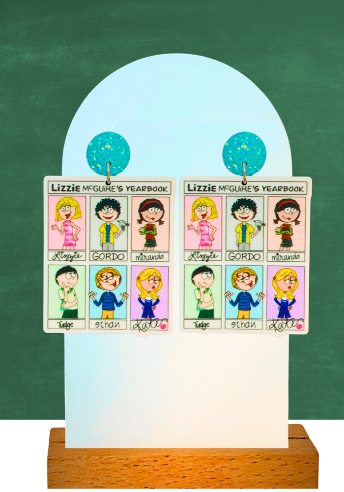 Earrings featuring Lizzie McGuire's yearbook collage with characters Lizzie, Gordo, Miranda, and more.