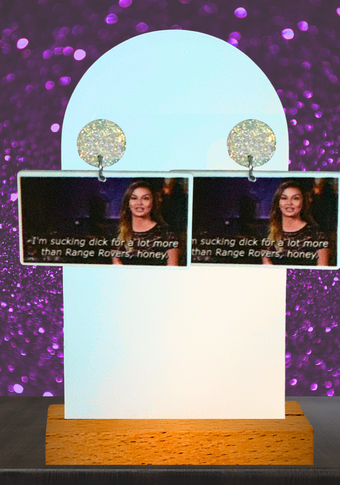 Earrings featuring Lala Kent’s talking head quote “I’m sucking **** for a lot more than a Range Rover” from Vanderpump Rules.
