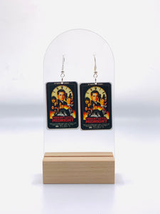 Earrings designed with the dazzling movie poster from 'The Office's' 'Threat Level Midnight', showcasing Michael Scarn in all his secret agent glory
