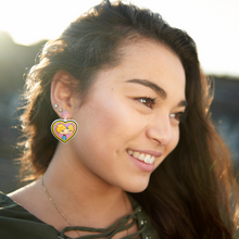 Load image into Gallery viewer, Helga’s Secret Love’ Locket Earrings – Featuring Arnold from Hey Arnold!, these nostalgic earrings capture the essence of young love and cartoon crushes
