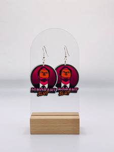 "Earrings featuring a vibrant retro pattern background, highlighting the unforgettable moment Dwight Schrute wears the CPR dummy's face, with the phrase 'Ignorant Slut' below.