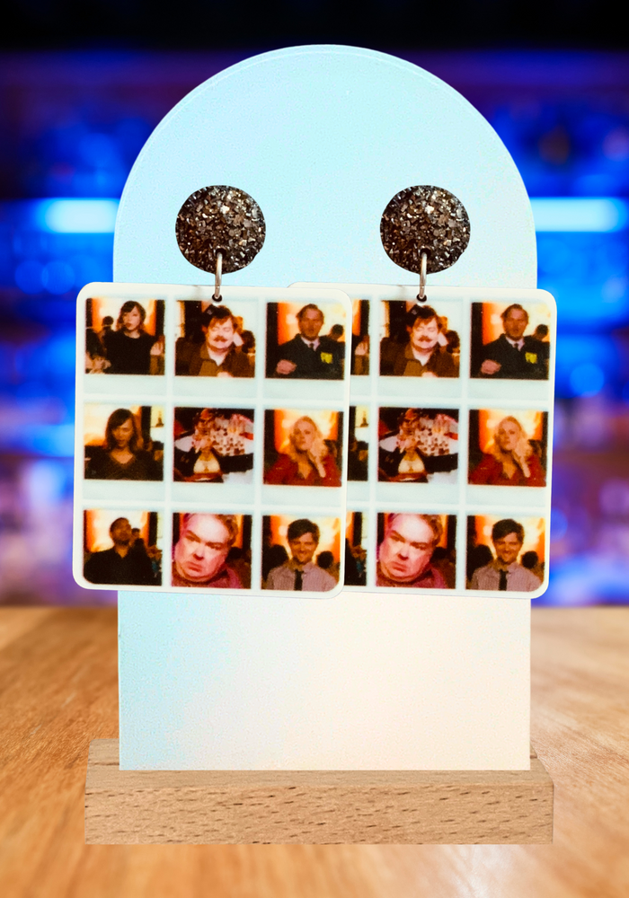 Parks and Rec earrings depicting the gang drunk on Snake Juice, a fun tribute to the show's wildest party episode for fans.
