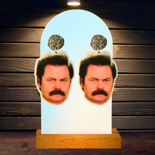 Load image into Gallery viewer, Close-up of Ron Swanson’s face on Parks and Rec inspired earrings, capturing the essence of his iconic, no-nonsense expression for fans to wear with pride.
