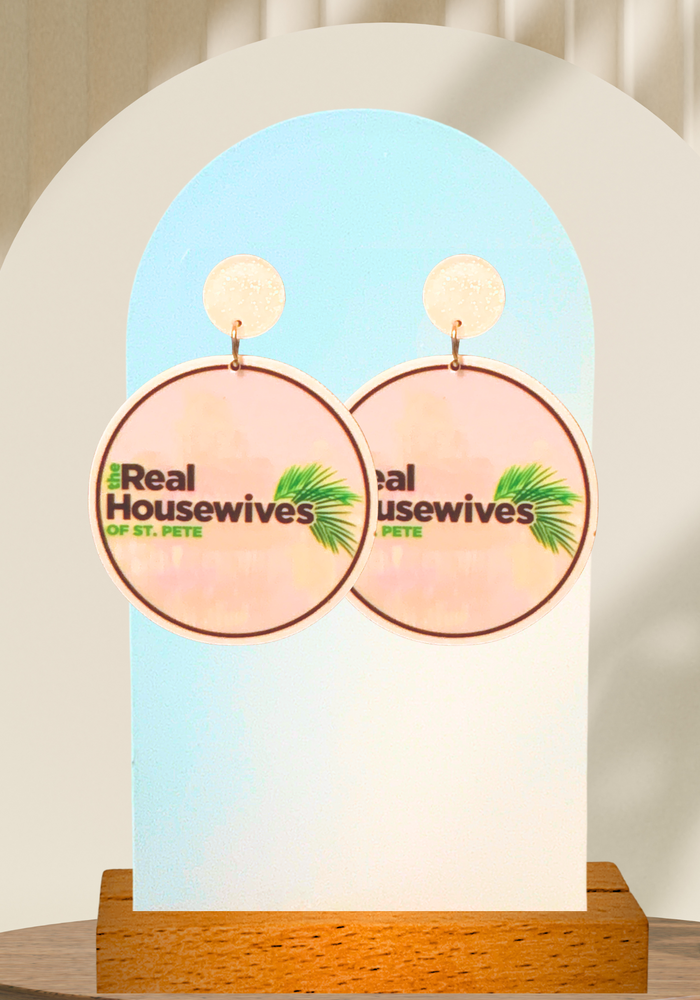 Earrings featuring the St Pete pier with the text 