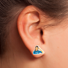 Load image into Gallery viewer, A close up photo of an ear wearing the Rachel Green ‘Salmon Skin Roll’ studs from Friends
