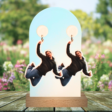 Load image into Gallery viewer, Earrings on a garden table featuring Nick Miller jumping up in the air, from his infamous “Freeze Frame” New Girl moment
