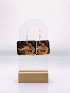 Earrings depicting Mose Schrute from 