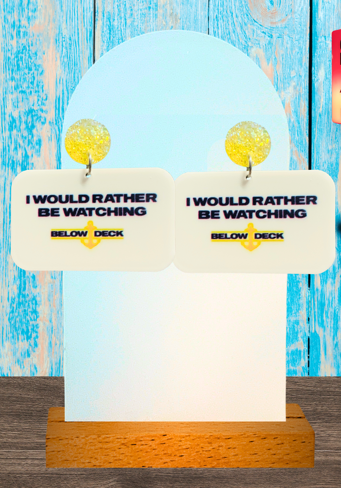 Earrings with the text 