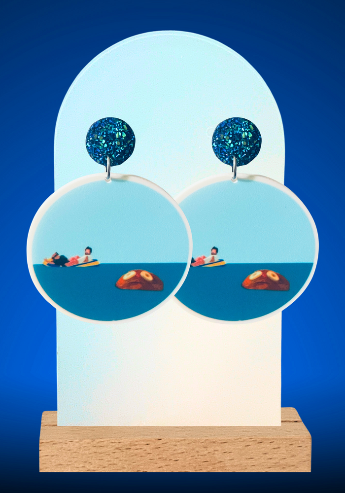 Earrings featuring Mac and Frank from Always Sunny watching their rum ham float away into the ocean