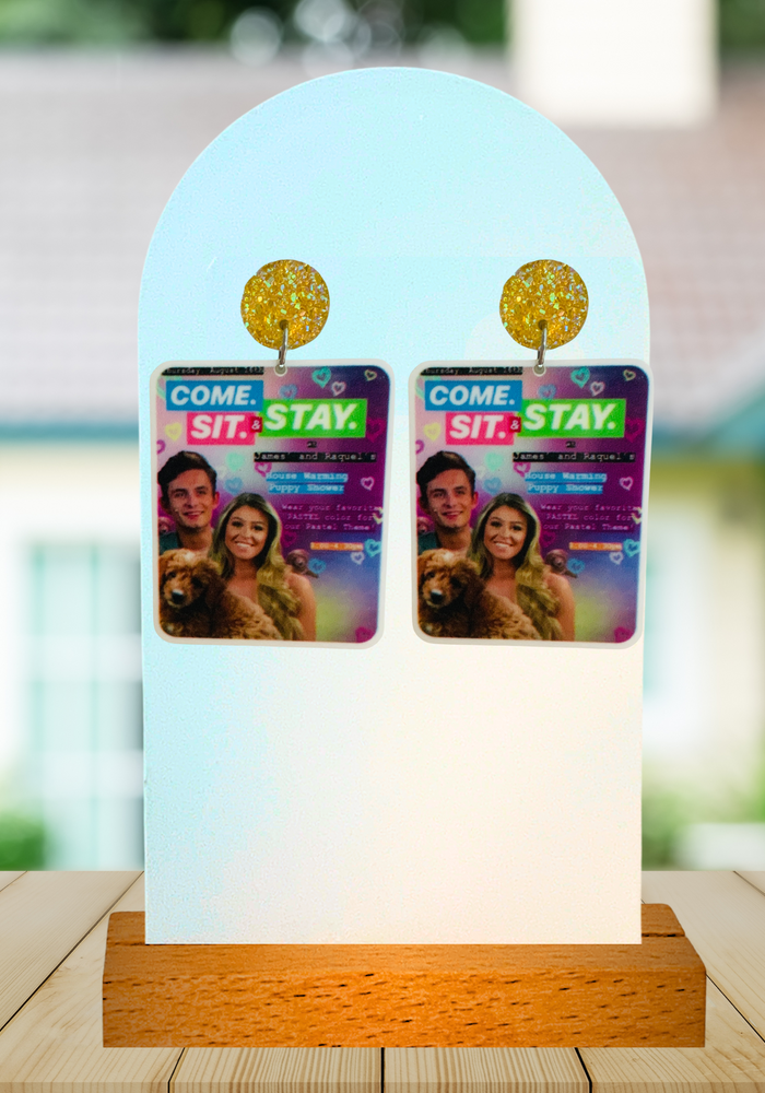 Earrings featuring the invite from James and Raquel's Season 7 puppy shower for their dog Graham