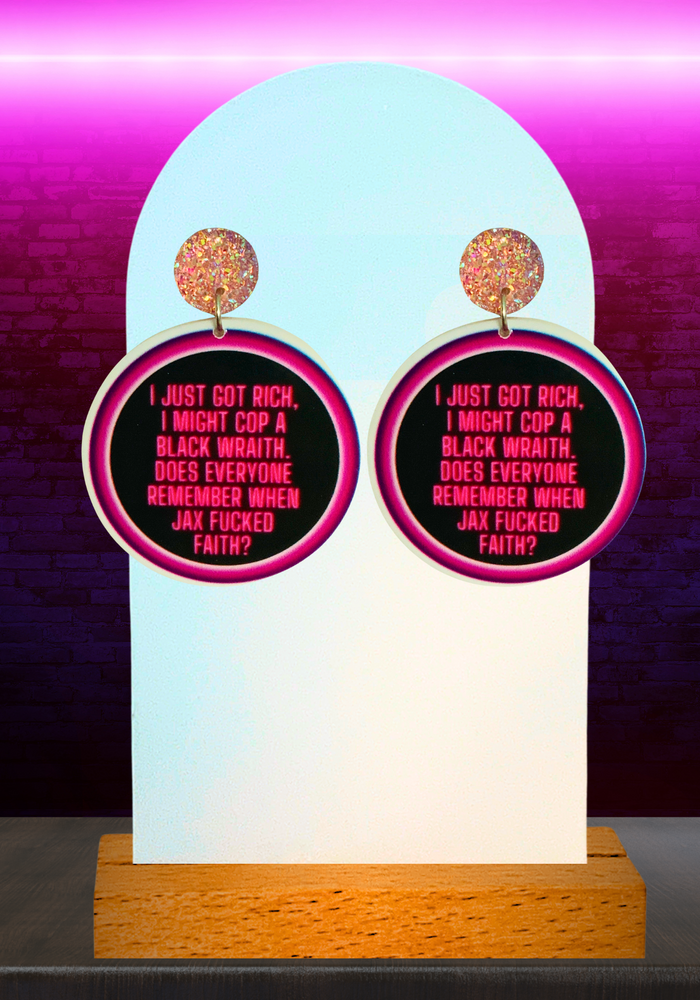 Earrings featuring James Kennedy's diss rap lyrics about Jax Taylor from Vanderpump Rules' See You Next Tuesday.