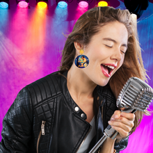 Load image into Gallery viewer, A rockstar singing into a microphone while wearing Vanderpump Rules earrings featuring Charles McMansion with the neon lyrics &quot;Let&#39;s Touch in Public&quot; on the front
