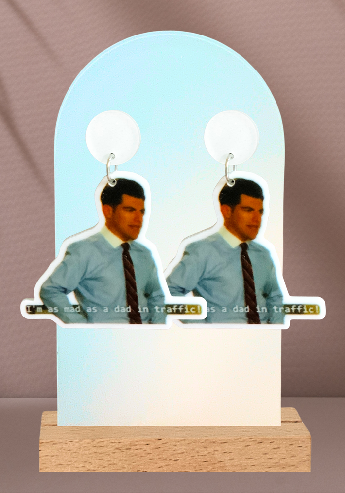 Earrings featuring Schmidt from New Girl saying “I’m Mad as a Dad in Traffic”