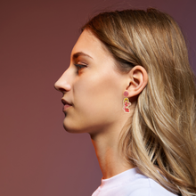 Load image into Gallery viewer, A girl with her head turned wearing Lizzie McGuire earrings
