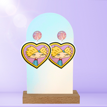 Load image into Gallery viewer, Helga’s Secret Love’ Locket Earrings – Featuring Arnold from Hey Arnold!, these nostalgic earrings capture the essence of young love and cartoon crushes
