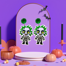 Load image into Gallery viewer, An earring stand featuring earrings of a cute cartoon version of Beetlejuice, perfect for fans of the classic film and nostalgic Halloween fun.
