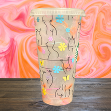 Load image into Gallery viewer, A 16 oz BPA-free Starbucks-compatible reusable cold cup featuring a vinyl wrap with minimalist female body line art, butterflies, and floral accents. Includes a clear lid and reusable straw, perfect for empowering iced coffee enthusiasts.
