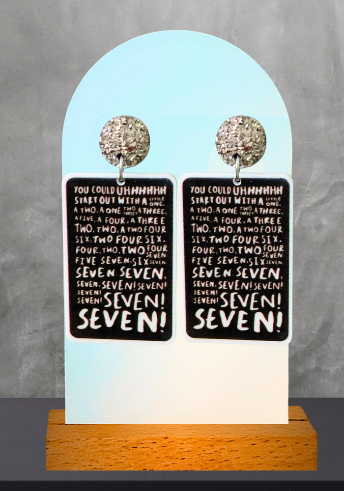 Friends earrings that say 