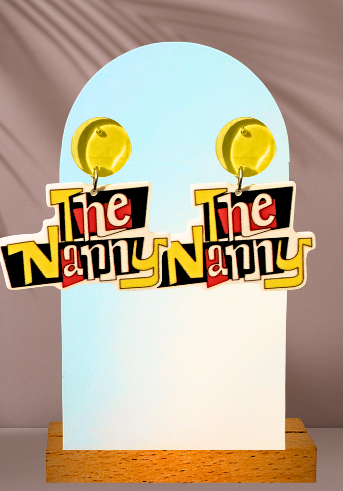Earrings that feature The Nanny logo on a boho backdrop