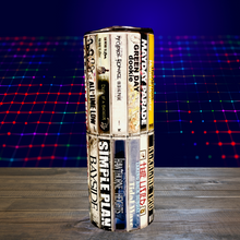 Load image into Gallery viewer, A 20 oz stainless steel insulated tumbler featuring sublimated cassette designs with band names from the Elder Emo era, including Paramore, Fall Out Boy, My Chemical Romance, Blink-182, and The All-American Rejects. Comes with a secure lid and reusable straw, perfect for hot and cold drinks.

