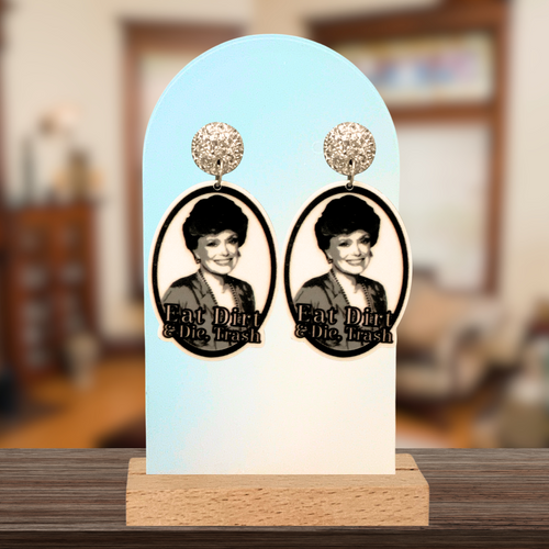 Earrings featuring a smiling Blanche from Golden Girls with the snarky saying 