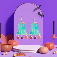 Load image into Gallery viewer, Translucent purple ghost earrings with floral accents and dangling flowers, perfect for fans of fun and unique Halloween accessories.
