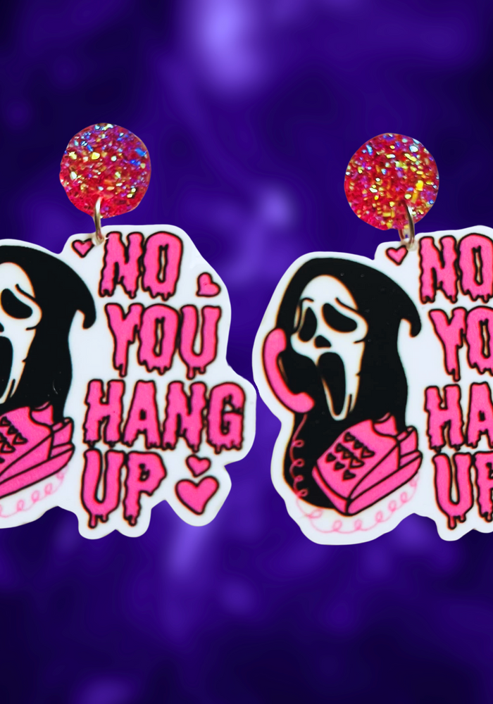 Pink Ghostface earrings featuring the killer on the phone saying 'No You Hang Up,' designed for fans of the Scream movie and fun Halloween accessories.