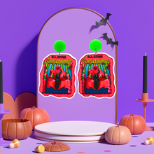 Load image into Gallery viewer, Goosebumps &#39;Living Dummy&#39; book cover earrings on a purple stand perfect for a fun and nostalgic accessory for 90s horror fans
