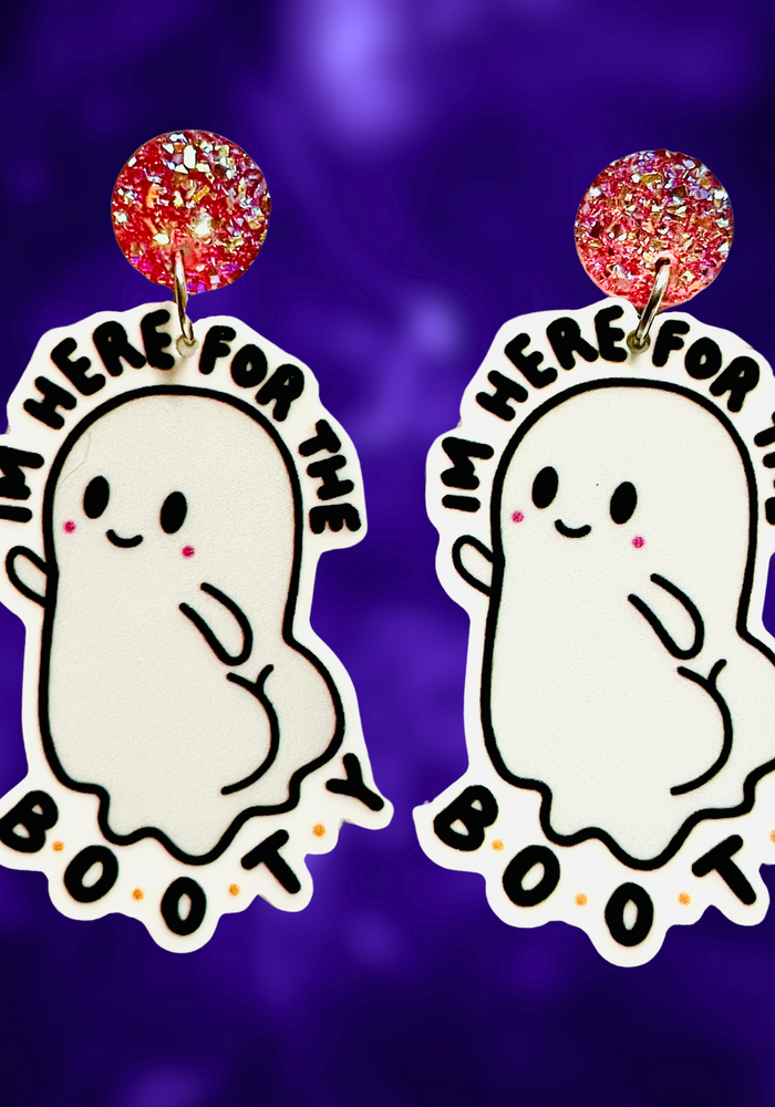 A pair of fun Halloween ghost earrings with the text 'Here for the BOOty,' designed for adding a playful, quirky touch to Halloween accessories and fashion.