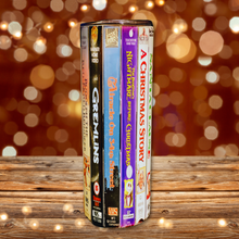 Load image into Gallery viewer, A 20 oz stainless steel insulated Christmas Movie Tumbler featuring a colorful design with movie covers including Gremlins, Miracle on 34th Street, Nightmare Before Christmas, and a Christmas Story. Comes with a clear lid, metal straw, and straw cleaner, perfect for hot and cold drinks.
