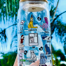 Load image into Gallery viewer, A 20 oz glass cup featuring colorful cat illustrations and Taylor Swift album-inspired designs, with the phrase &quot;Karma is a Cat,&quot; paired with a bamboo lid and glass straw. Perfect for Swifties and cold drink lovers.
