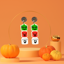 Load image into Gallery viewer, Earrings featuring a stack of nostalgic Halloween buckets, perfect for fans of 90s Halloween nostalgia and cute spooky décor
