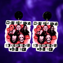 Load image into Gallery viewer, Earrings with the quote &#39;Why are you so obsessed with me?&#39; featuring horror icons Freddy Krueger, Michael Myers, Ghostface, Pennywise, and Jigsaw, perfect for a fun and bold Halloween look
