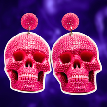 Load image into Gallery viewer, Pink rhinestone skull earrings, perfect for fans of girly and glamorous Halloween accessories.
