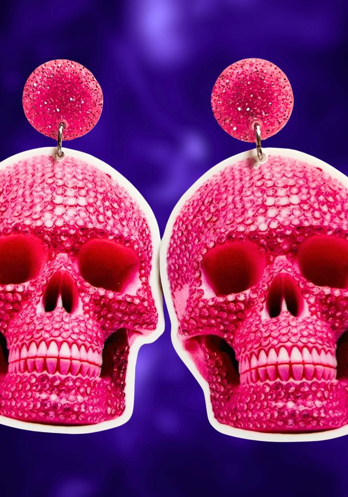 Pink rhinestone skull earrings, perfect for fans of girly and glamorous Halloween accessories.