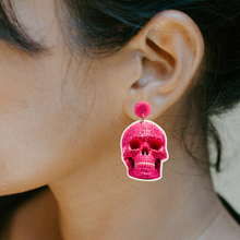 Load image into Gallery viewer, Pink rhinestone skull earrings, perfect for fans of girly and glamorous Halloween accessories.
