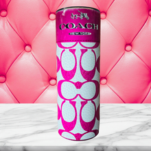 Load image into Gallery viewer, A 20 oz stainless steel insulated tumbler featuring a white and pink leather-inspired background with the signature &quot;C&quot; pattern. Comes with a clear lid, metal straw, and straw cleaner, perfect for hot and cold drinks. Discounted for minor ghosting spots.
