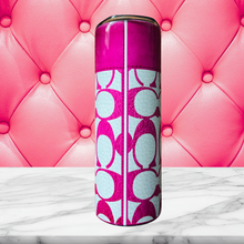 Load image into Gallery viewer, Backside of 20 oz stainless steel insulated tumbler featuring a white and pink leather-inspired background with the signature &quot;C&quot; pattern. 
